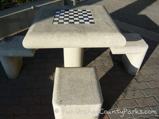 concrete table and benches with built-in chess/checker board