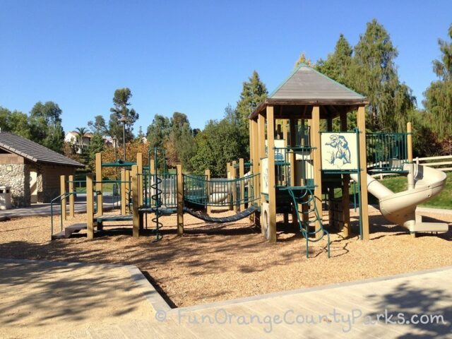 Pioneer Road Park: Log Cabin Picnicking and Uncovered Wagons