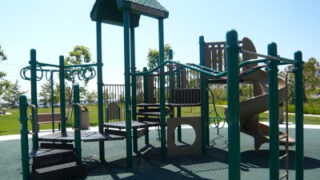 Fred Barrera Park: Take a Spin on the Walking Trail or Hang from Loopy Monkey Bars