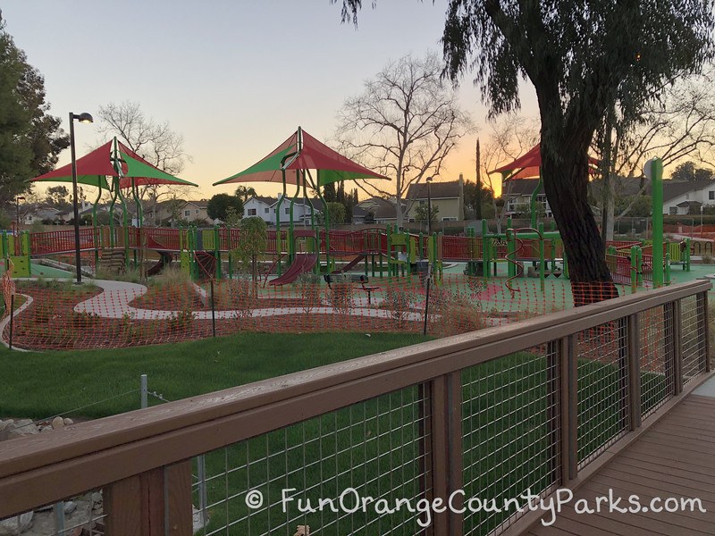 view of cherry park playground from wooden bridge