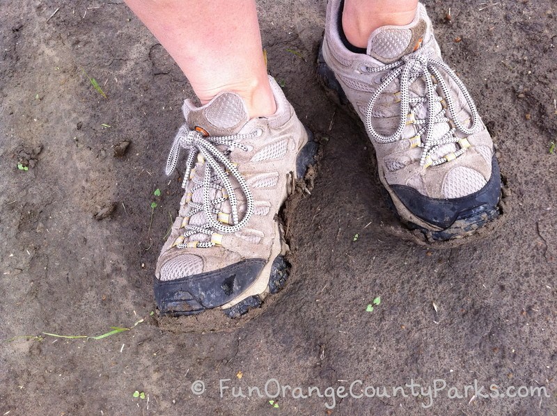 view of muddy hiking shoes from patriot hill flagpole hike