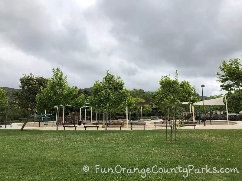 playground equipment with grass in foreground