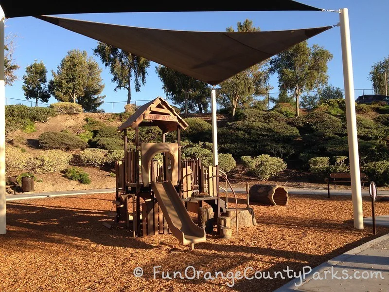 tamarisk park lake forest - shaded treehouse play structure