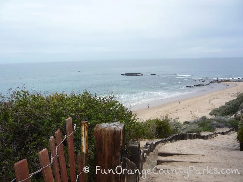 reef point crystal cove state park - stairs down to beach with sand and tidepools visible below