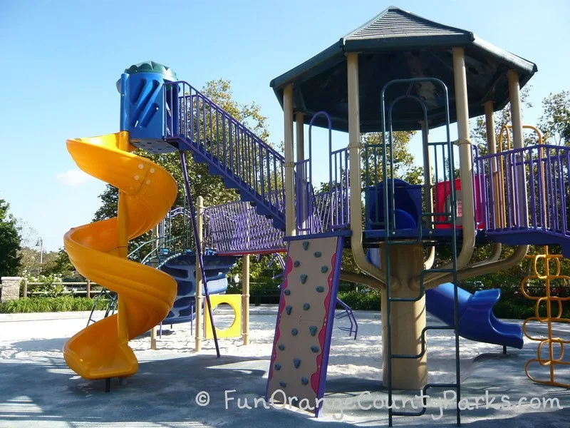 Playground with yellow twisty slide at Melinda Park Mission Viejo 