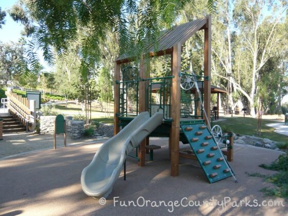 serrano creek park lake forest - playground with slide and steering wheel