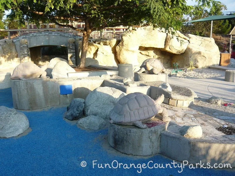 Dinosaur Park Laguna Hills view of turtles and cave area with diggers