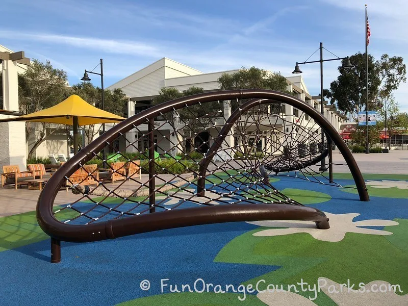 Spiderweb play structure at Woodbridge Center Irvine