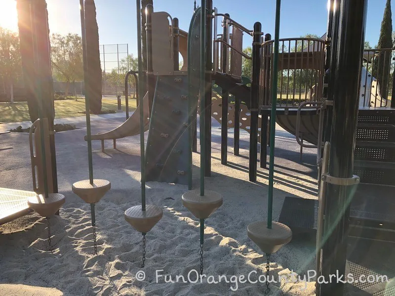Stonegate Park in Irvine balancing pedestals on smaller play structure.