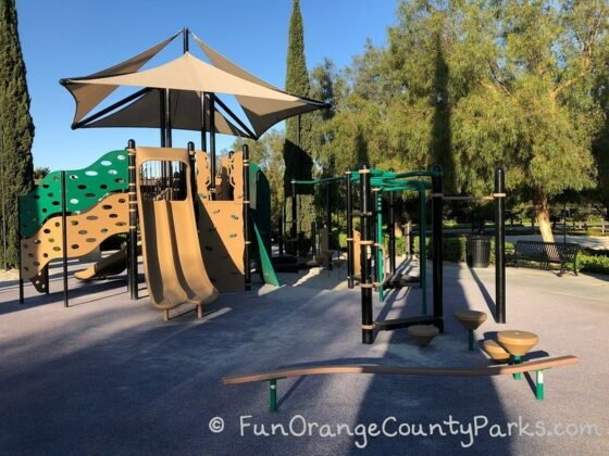 Stonegate Park in Irvine playground equipment for big kids including slides, climber and monkey bars.