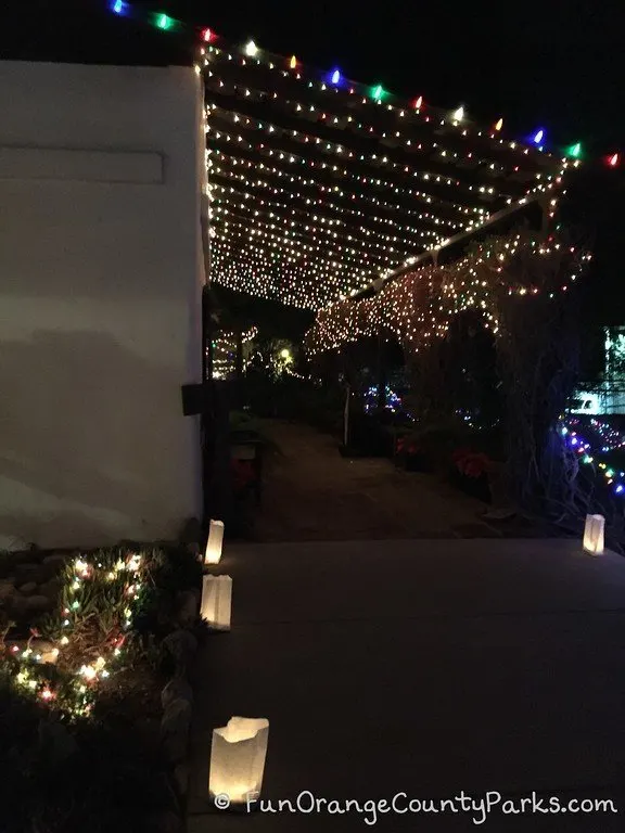Candlelight Walk at Heritage Hill adobe building with holiday lights