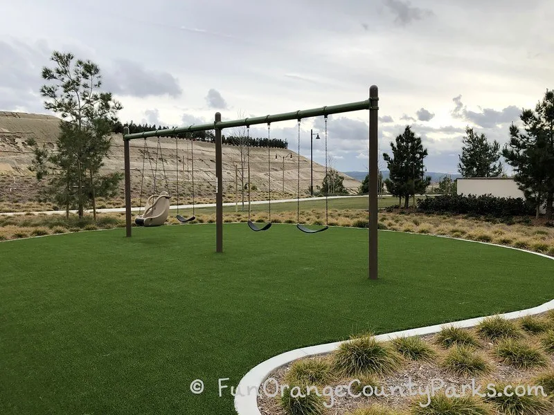 portola springs community park irvine - bench swings and adaptive swing