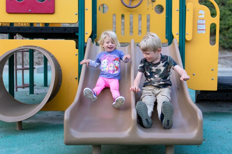 photograph your children racing down slides