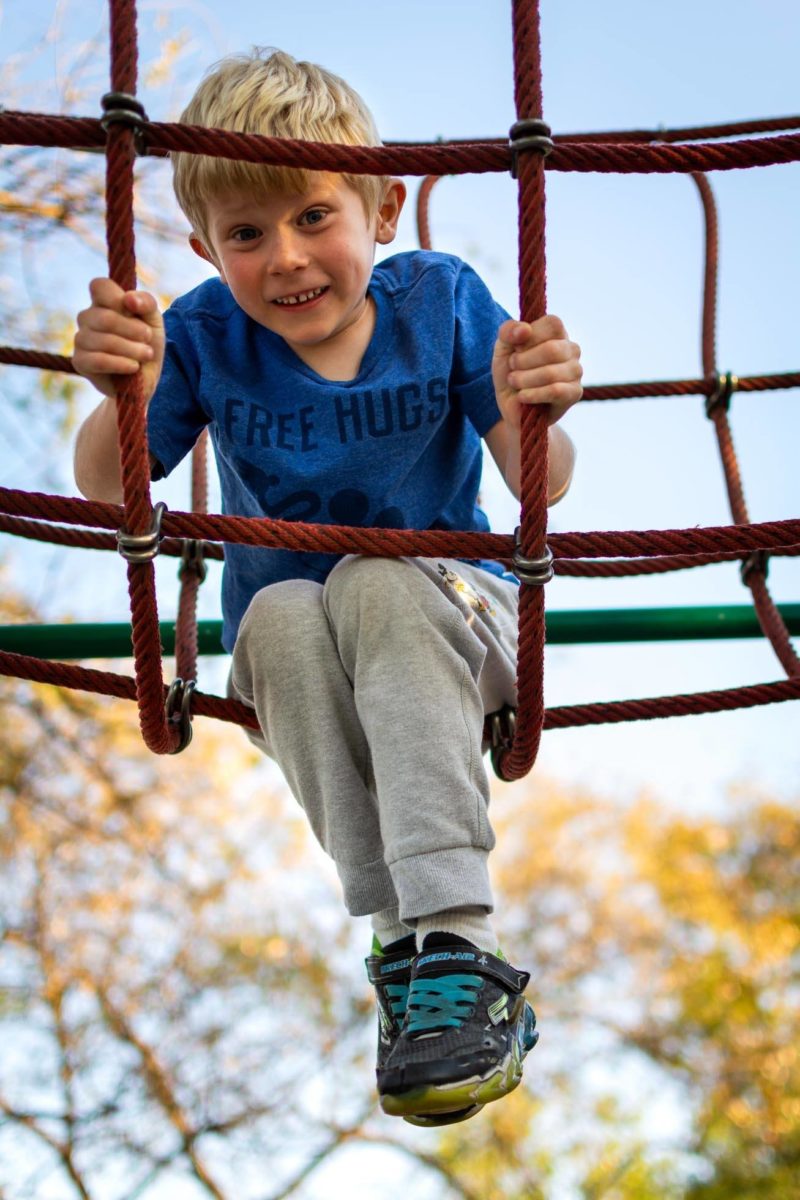 boy on a rope bridge