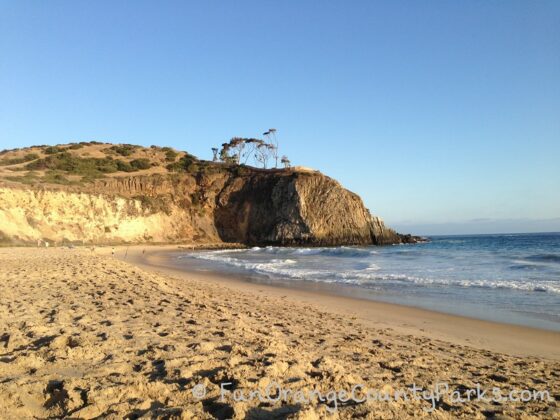 el moro beach sand area with waves breaking in front of Abalone Point