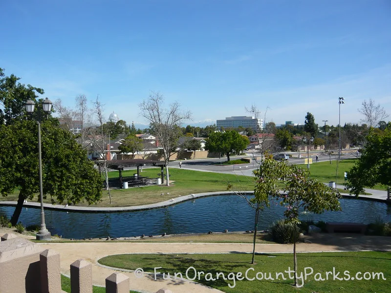 snow-capped mountains in the background above the moat at the play island