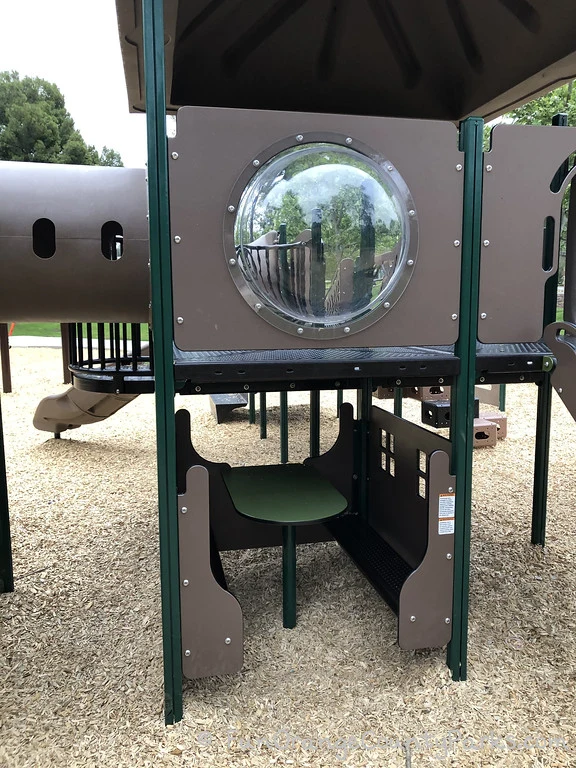 clubhouse table underneath a plastic bubble