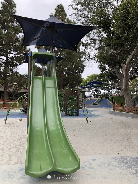 double green slides leading from big play structure