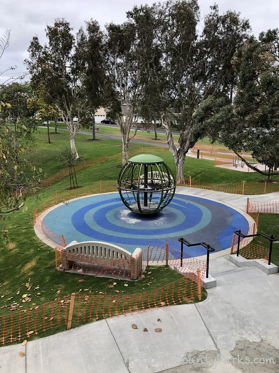 aerial view of the spinning globe equipment at Grant Howald Park in Newport Beach